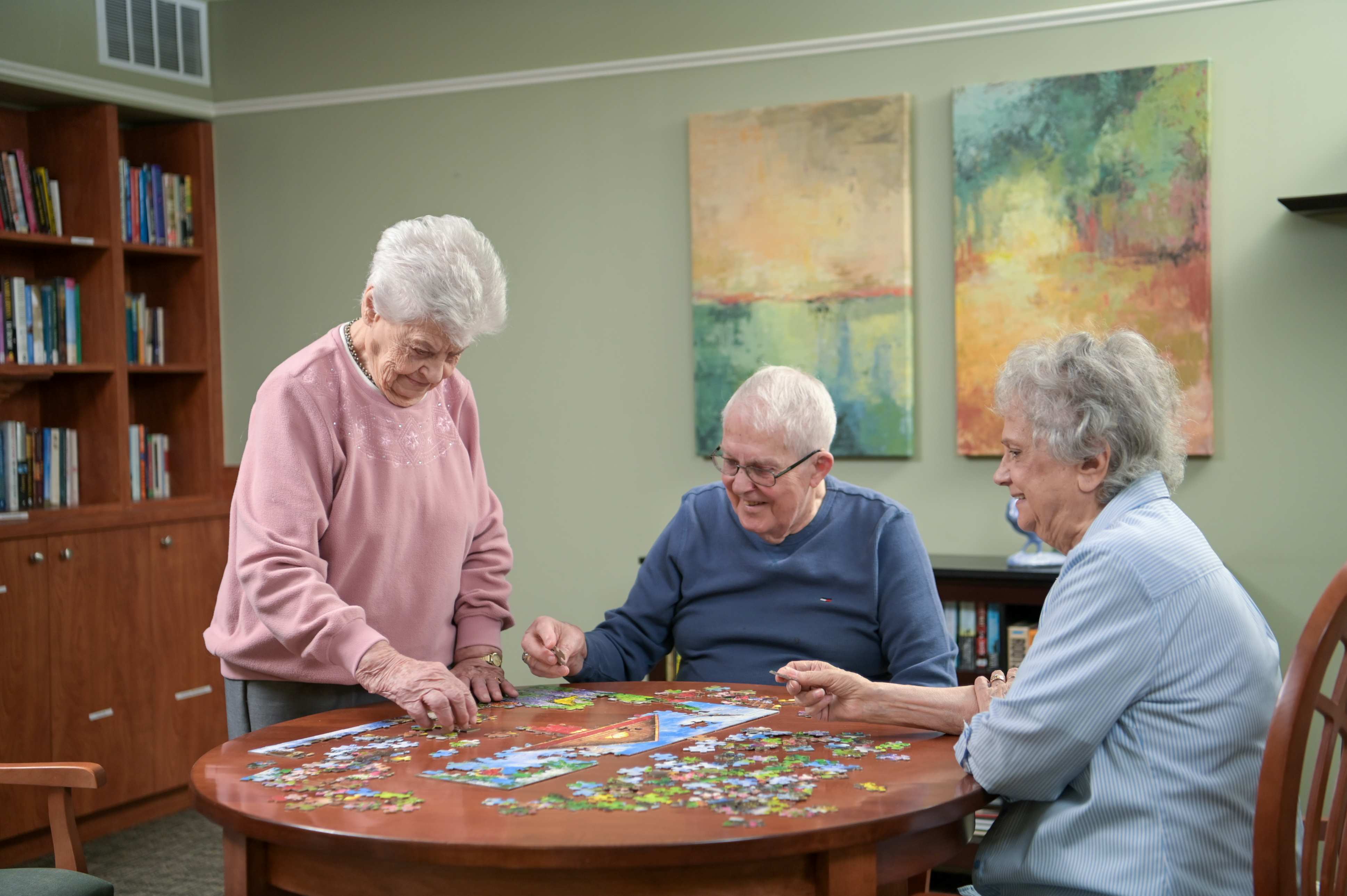 people doing a puzzle