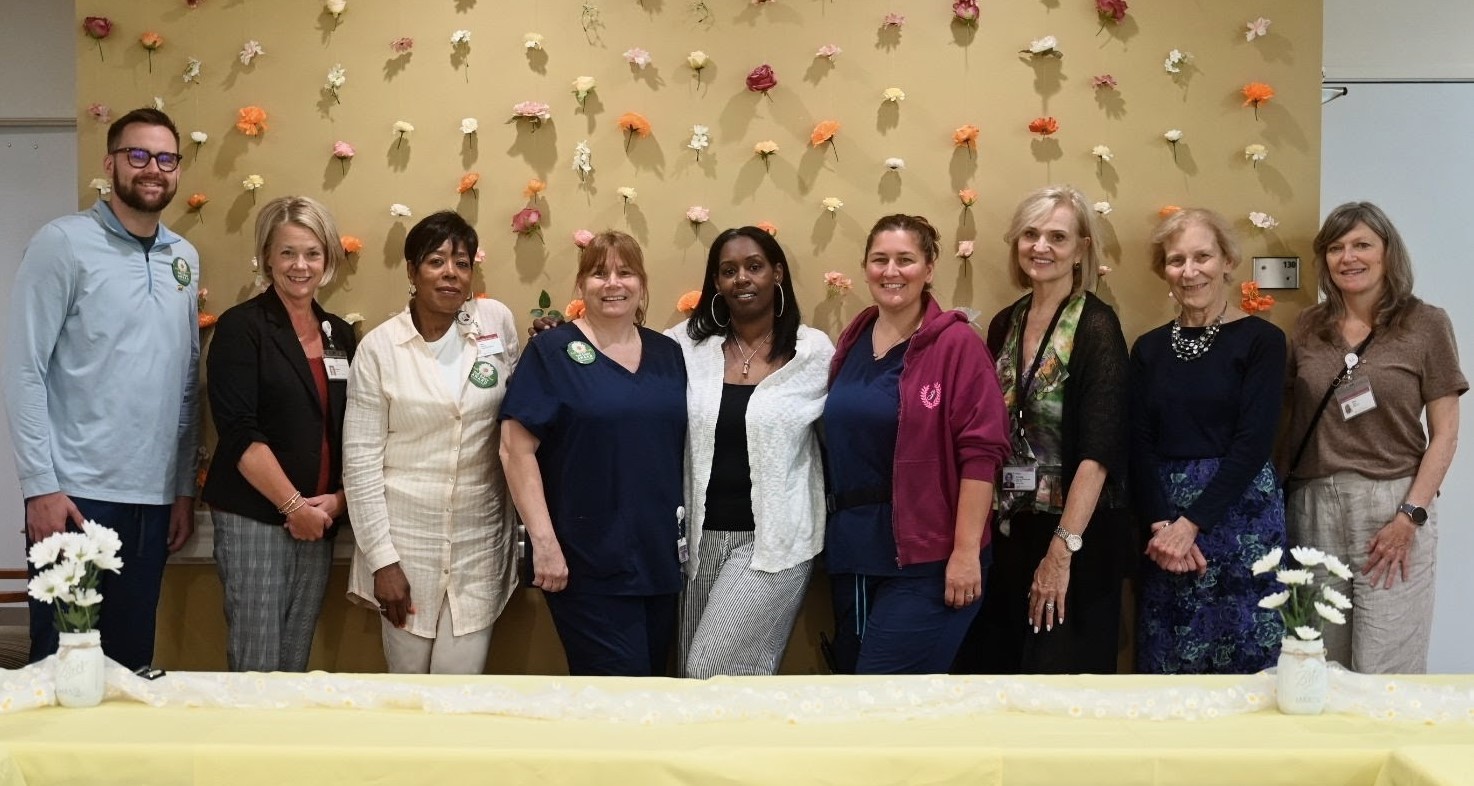 Group of individuals with Daisy award recipient Leslie Yarborough